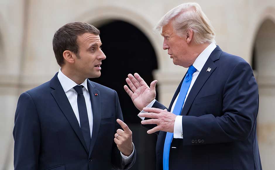The body language between the two men was warm, with Trump even giving Macron a lift from the museum back to the presidency in his eight-tonne car, known as 'The Beast'. AP The body language between the two men was warm, with Trump even giving Macron a lift from the museum back to the presidency in his eight-tonne car, known as 'The Beast'. AP