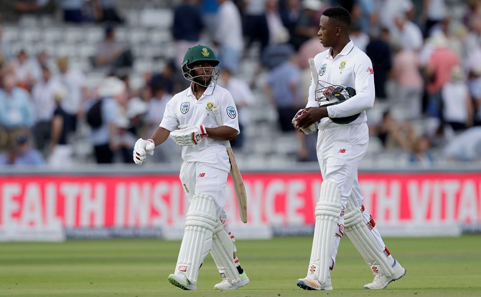 Temba Bavuma and Kagiso Rabada survived the day with South Africa coring 214 for 5 by the end of the play. AP
