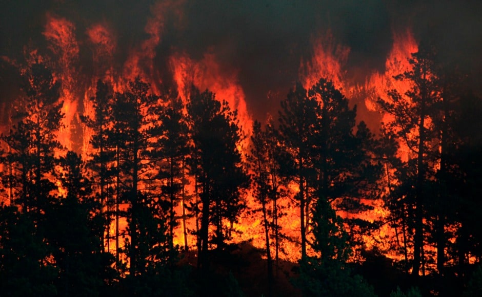 Thousands of people have been served evacuation orders as wildfires spread across US and Canada on Sunday. AP Thousands of people have been served evacuation orders as wildfires spread across US and Canada on Sunday. AP