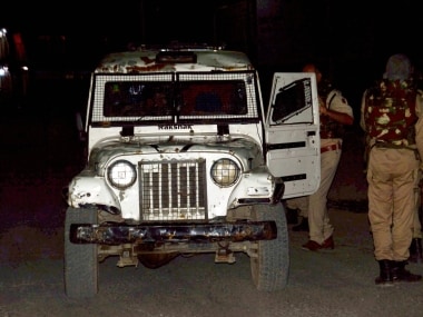 A security person stand guard after militants opened fire on the Amarnath Yatra. PTI