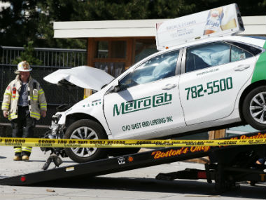US: Taxi in Boston crashes into group of cab drivers, injures 10 people US: Taxi in Boston crashes into group of cab drivers, injures 10 people