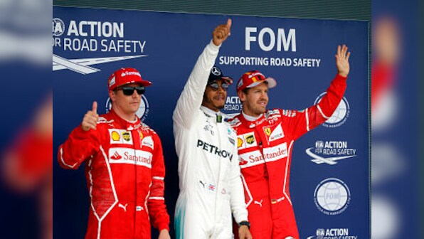 British Grand Prix: Lewis Hamilton clinches pole ahead of Kimi Raikkonen in rain-affected qualifiers