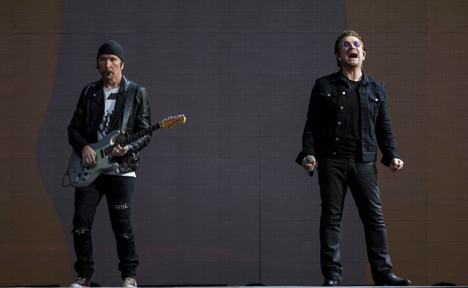 Irish rock band U2 perform Joshua Tree tour in UK; pay tribute to slain ...