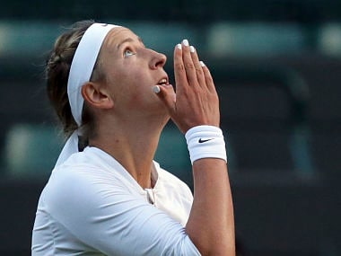 Victoria Azarenka of Belarus celebrates after winning her Women's Singles Match against CiCi Bellis of the United States, on the opening day at the Wimbledon Tennis Championships in London Monday, July 3, 2017. (AP Photo/Tim Ireland)