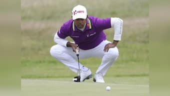 British Open 2017: Jordan Spieth grabs co-lead after wretched morning weather plagues Day 1