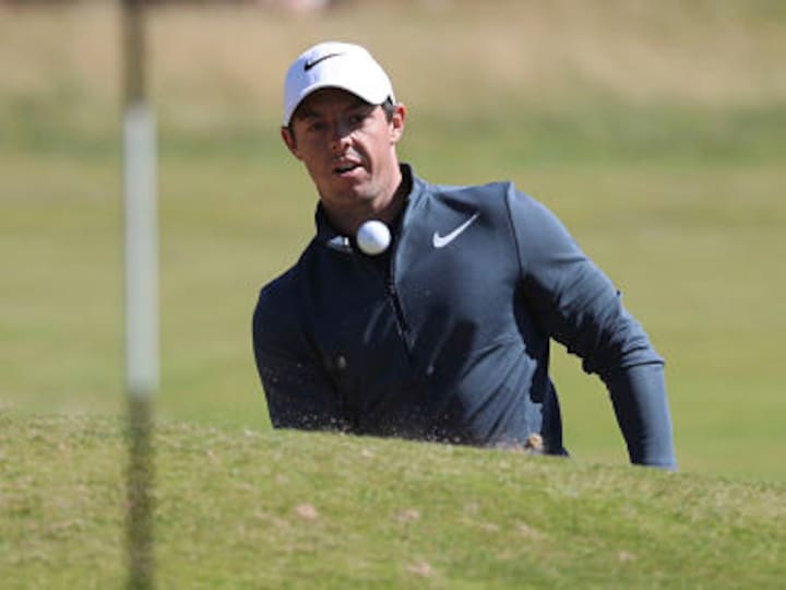 British Open 2017: Rory McIlroy overcomes disastrous start to remain in contention after Day 1