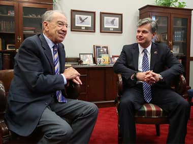 Senate Judiciary Committee Chairman Chuck Grassley (R-IA) (L) meets with FBI Director nominee Christopher Wray,