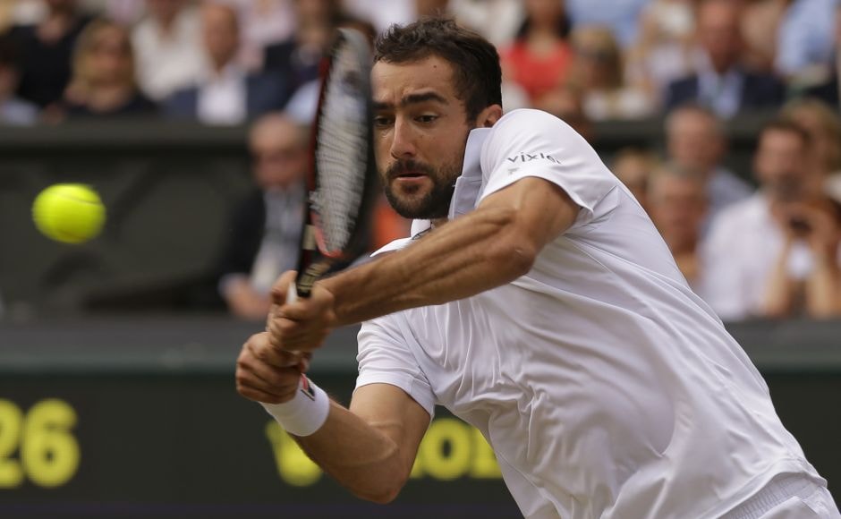 Federer, appearing in his 11th Wimbledon final, was challenged early on by Cilic. AP Federer, appearing in his 11th Wimbledon final, was challenged early on by Cilic. AP