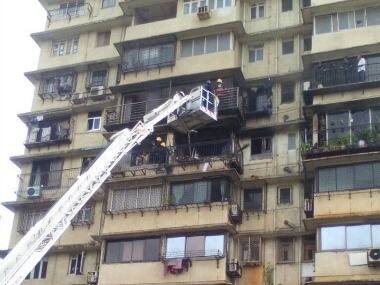Fire breaks out inside locked flat of Worli residential building; short-circuit may be cause