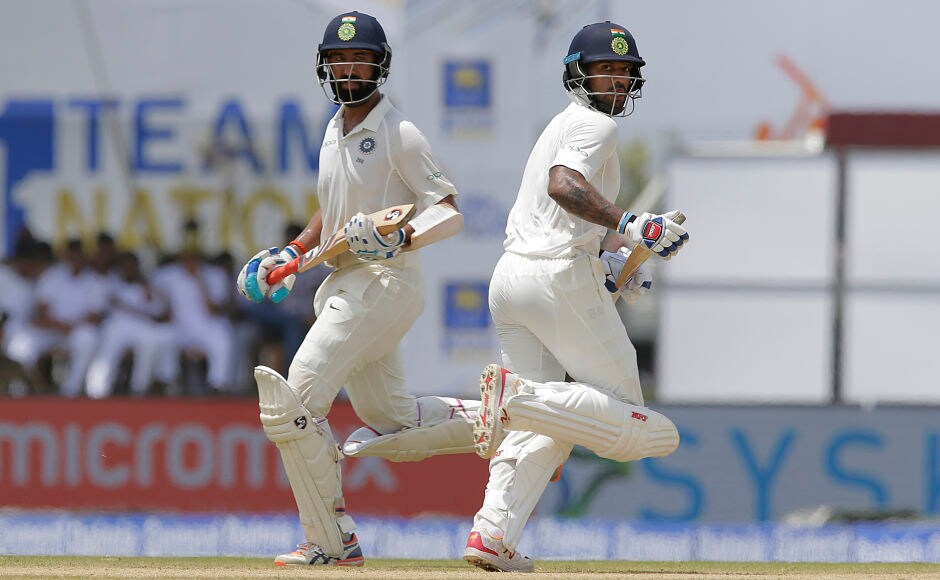 After Mukund's wicket, Shikhar Dhawan and Cheteshwar Pujara frustrated Sri Lanka and stitched a 253-run stand. AP