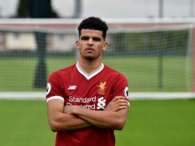 Dominic Solanke poses after joining Liverpool from Chelsea. Twitter: @LFC