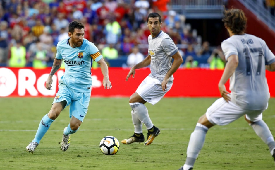 Barcelona's Lionel Messi, left, dribbles against Manchester United's Henrikh Mkhitaryan, center, and Daley Blind during the first half of the International Champions Cup match. AP Barcelona's Lionel Messi, left, dribbles against Manchester United's Henrikh Mkhitaryan, center, and Daley Blind during the first half of the International Champions Cup match. AP