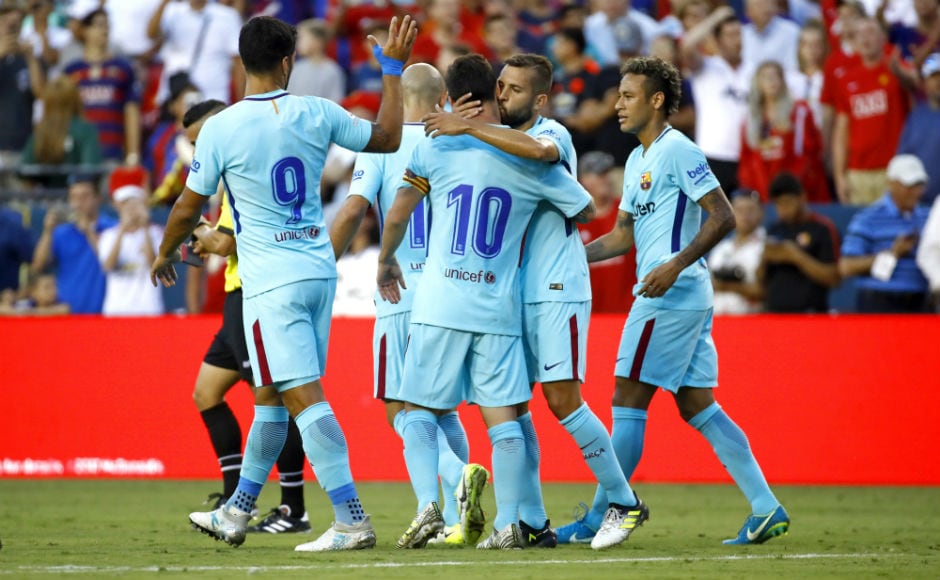 Barcelona players celebrate after Neymar scored a goal in the first half. AP Barcelona players celebrate after Neymar scored a goal in the first half. AP
