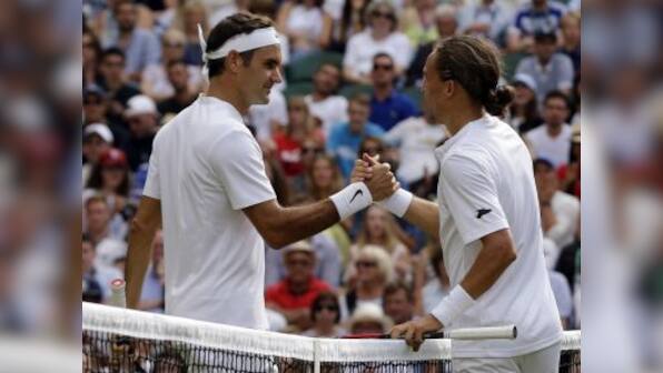 Wimbledon 2017: Roger Federer handed 85th win at All England Club after Alexandr Dolgopolov retires