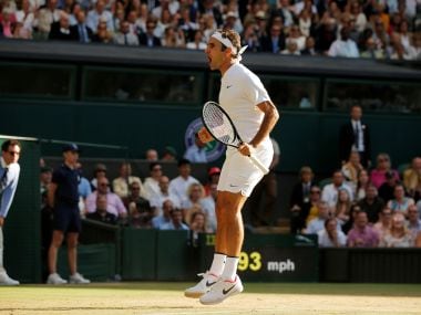 Roger Federer celebrates winning the quarter-final match against Milos Raonic. Reuters