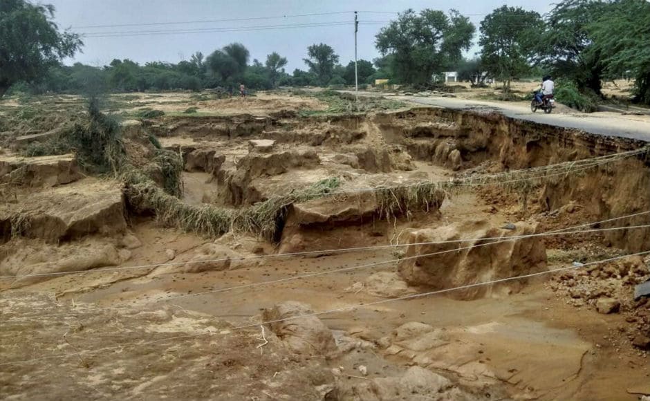 In Gujarat, over 4.5 lakh people have been affected. The dead toll has risen to 218 with with 61 people killed in worst-hit Banaskantha district. PTI In Gujarat, over 4.5 lakh people have been affected. The dead toll has risen to 218 with with 61 people killed in worst-hit Banaskantha district. PTI