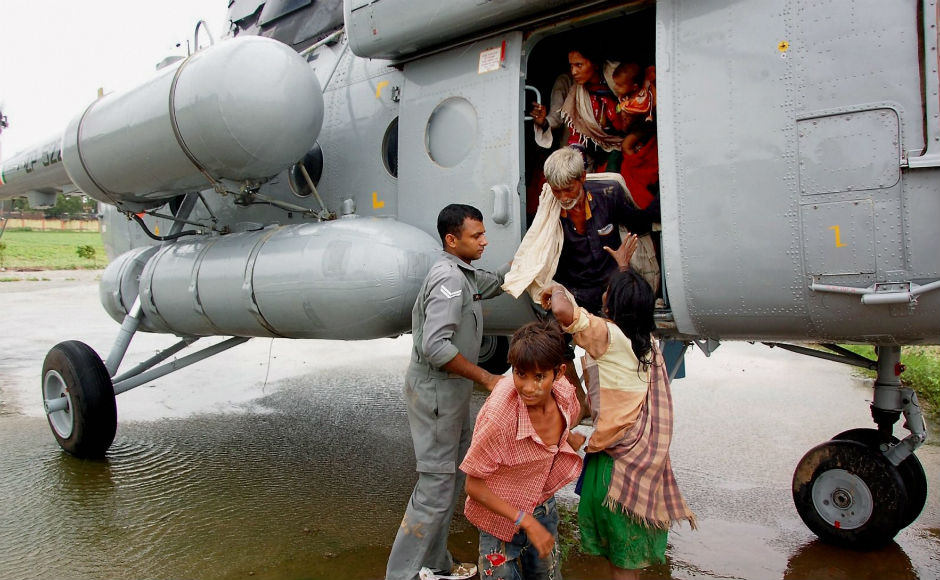 IAF's four MI-17 V5 helicopters winched 14 persons from Deesa. Total 113 people has been rescued by Tuesday. PTI