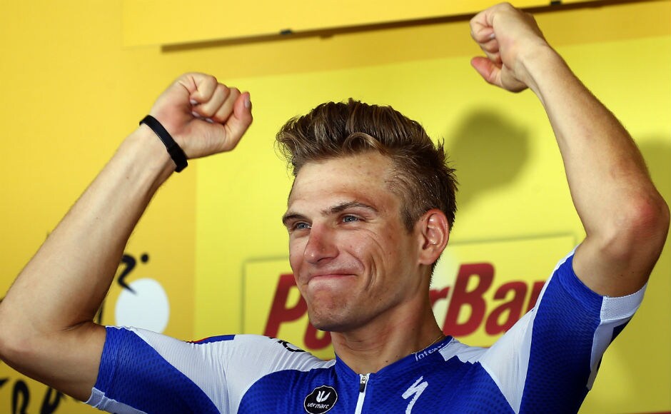 Germany's Marcel Kittel, celebrates on the podium after winning the tenth stage of the Tour de France cycling race over 178 kilometers (110.6 miles) with start in Perigueux and finish in Bergerac. AP