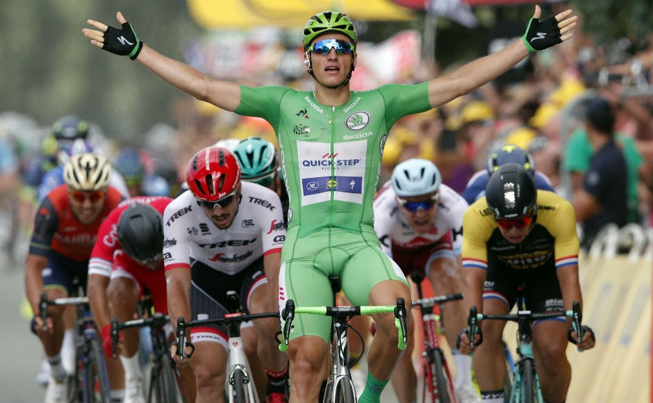 Germany's Marcel Kittel, wearing the best sprinter's green jersey celebrates as he crosses the finish line to win the tenth stage of the Tour de France cycling race over 178 kilometers (110.6 miles) with start in Perigueux and finish in Bergerac. AP
