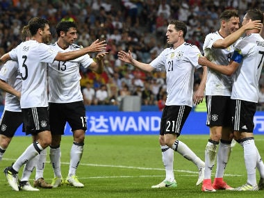 Germany players celebrate their third goal against Mexico in the semi-finals. AP