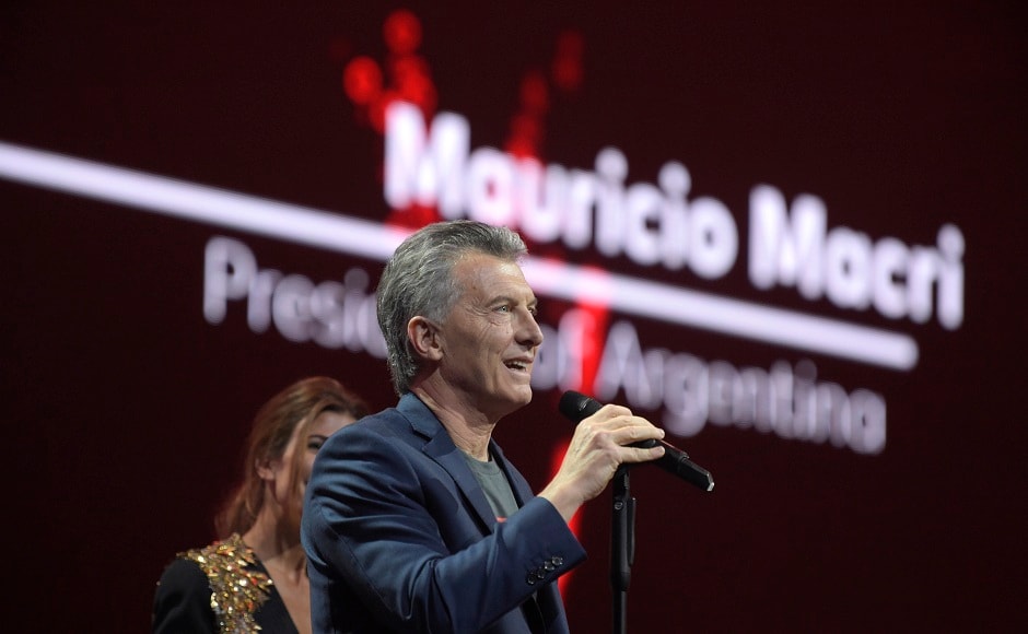 Argentinian President Mauricio Macri speaks to the crowd during the Global Citizen Festival concert on the eve of the G-20 summit in Hamburg, northern Germany, Thursday, July 6, 2017. The leaders of the group of 20 meet July 7 and 8. (AP Photo/Jens Meyer)