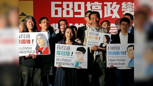 China cracks whip on pro-democracy Hong Kong lawmakers, Nathan Law among four disqualified from parliament