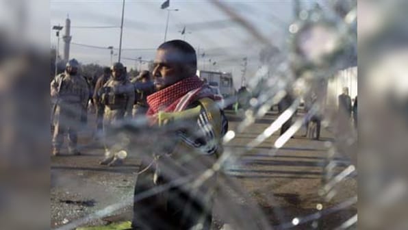 Suicide bomb attack kills 14 at camp for Iraq displaced; several wounded