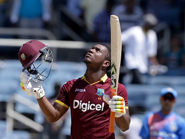 West Indies' Evin Lewis celebrates at the end of a T20I against India at Sabina Park cricket ground in Kingston, Jamaica, Sunday, July 9, 2017. West Indies won by nine wickets and Lewis scored 125 runs. (AP Photo/Ricardo Mazalan)