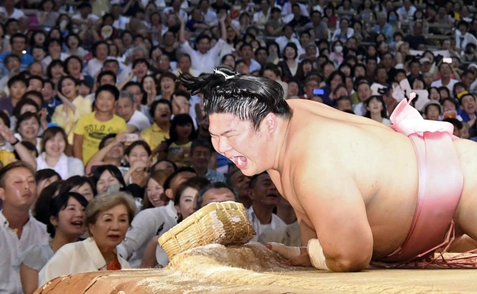 In Japan, sumo wrestling has been a tradition for centuries. In the sport, a sumo wrestler attempts to force another wrestler either out of the ring, or to touch the ground with any part of the body except the soles of their feet. AP In Japan, sumo wrestling has been a tradition for centuries. In the sport, a sumo wrestler attempts to force another wrestler either out of the ring, or to touch the ground with any part of the body except the soles of their feet. AP