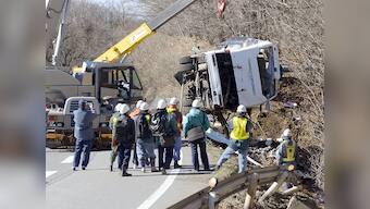 China bus accident: At least 19 killed after coach flips on highway in Guangdong