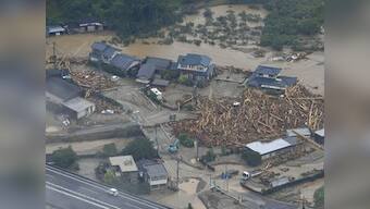 Huge floods sweep southern Japan, two dead, 18 missing