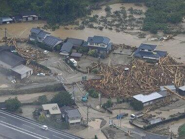 Huge floods sweep southern Japan, two dead, 18 missing