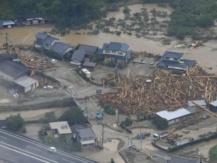 Huge floods sweep southern Japan, two dead, 18 missing