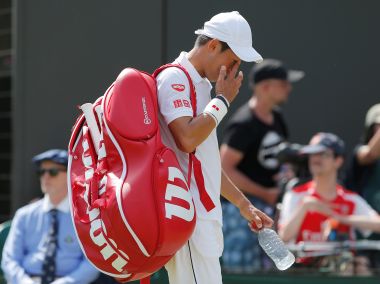 Tennis - Wimbledon - London, Britain - July 7, 2017 Japans Kei Nishikori reacts after losing his third round match against Spains Roberto Bautista Agut REUTERS/Andrew Couldridge - RTX3AI2D
