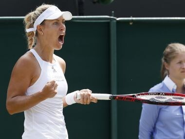 Germany's Angelique Kerber celebrates after winning a point against Shelby Rogers of the United States during their Women's Singles Match on day six at the Wimbledon Tennis Championships in London Saturday, July 8, 2017. (AP Photo/Kirsty Wigglesworth)