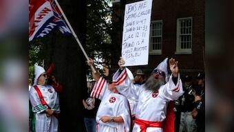 KKK marches to protest removal of confederate general's statue in Virginia, outnumbered by counter-protesters