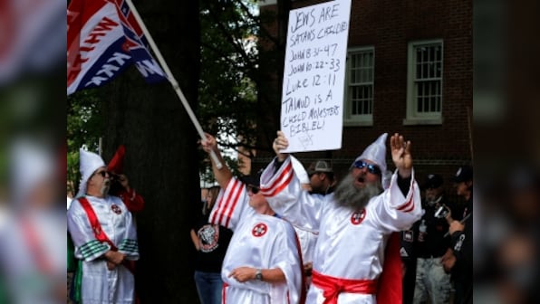 KKK marches to protest removal of confederate general's statue in Virginia, outnumbered by counter-protesters