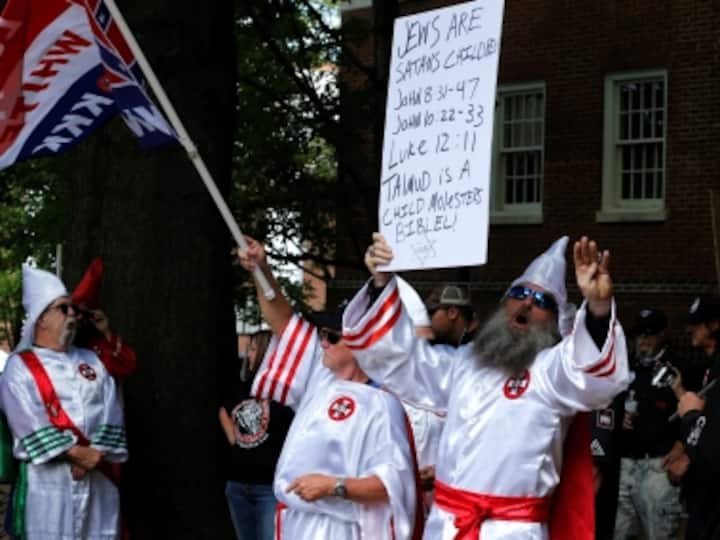 KKK marches to protest removal of confederate general's statue in Virginia, outnumbered by counter-protesters