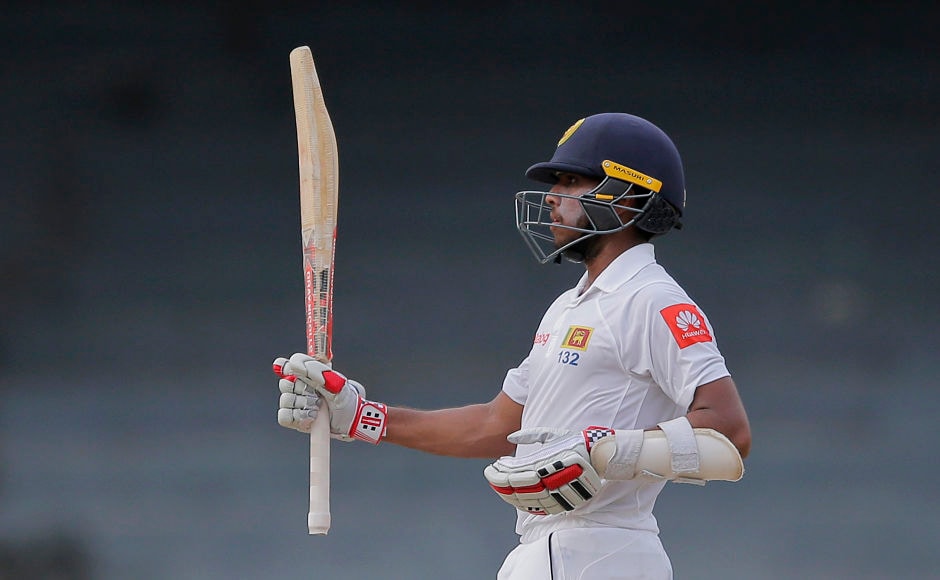 Amidst the storm, Sri Lanka's Kusal Mendis hit a fluent fifty to keep hosts' hopes alive in the 378-run chase. AP
