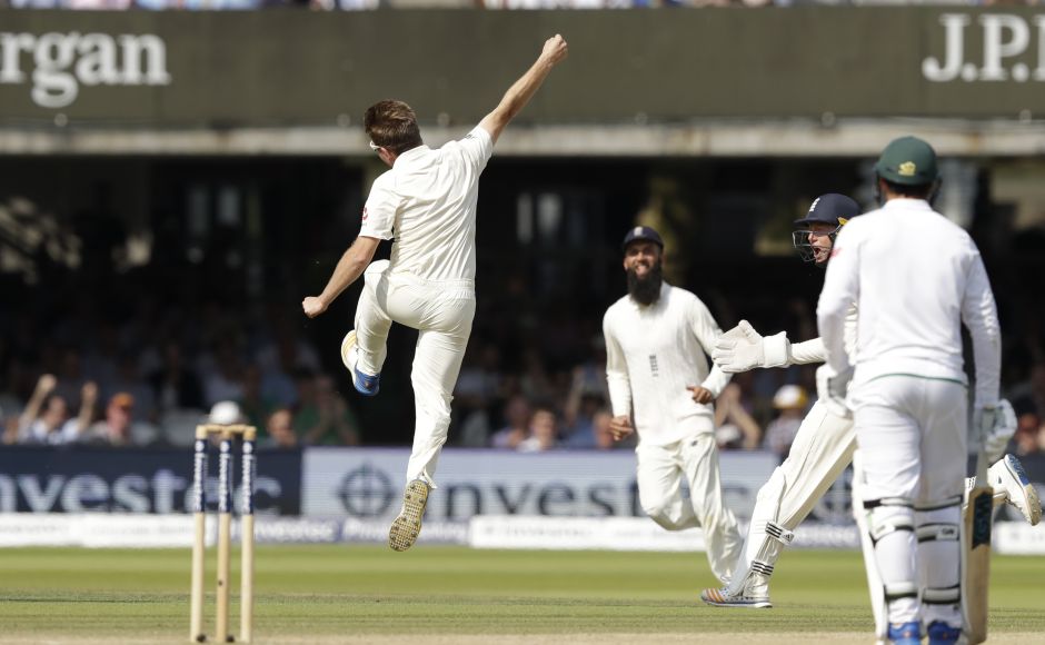 Liam Dawson celebrates after giving England a much-needed breakthrough by dismissing Hashim Amla 13 short of what would have been a 27th Test century. AFP