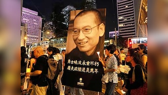 Liu Xiaobo dies at 61: Thousands march in Hong Kong in memory of pro-democracy campaigner