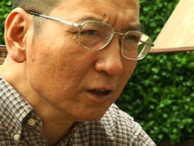 In this image taken from 3 June, 2008, video footage by AP Video, Liu Xiaobo speaks during an interview before his detention in Beijing, China.