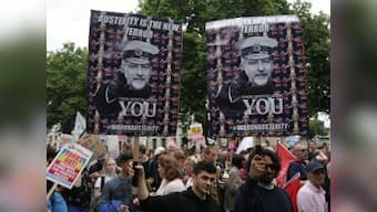 Thousands of protesters march through London; decry austerity, demand Theresa May's resignation