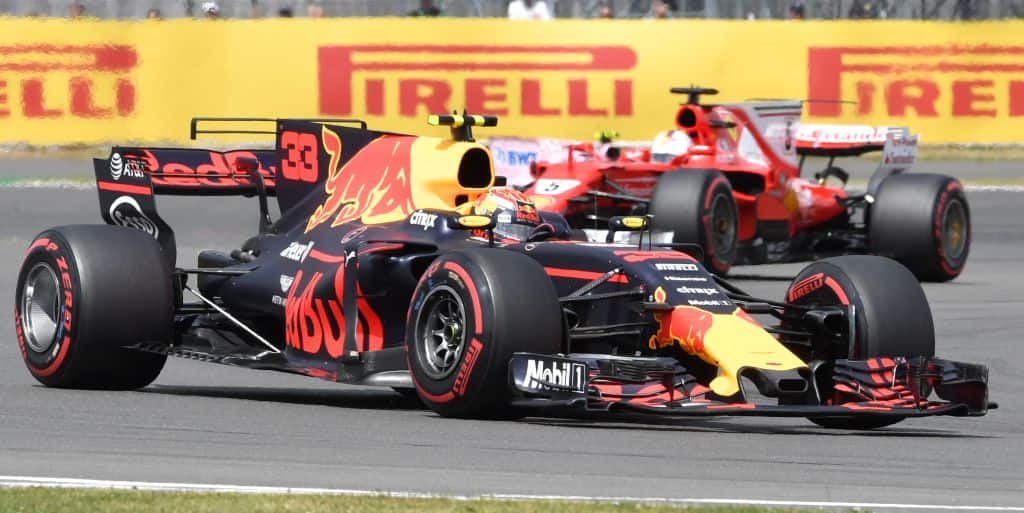 Red Bull’s driver Max Verstappen drives ahead of Ferrari’s Sebastian Vettel during the British Grand Prix. AFP