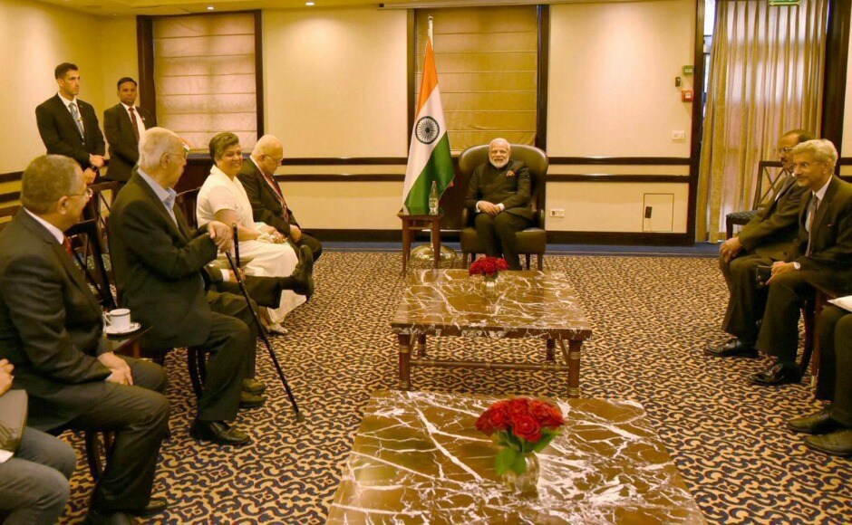 Narendra Modi and his delegation met recipients of the Pravasi Bharatiya Samman, an award instituted by the Indian government for Indians living abroad who achieve success in various fields. PTI Narendra Modi and his delegation met recipients of the Pravasi Bharatiya Samman, an award instituted by the Indian government for Indians living abroad who achieve success in various fields. PTI