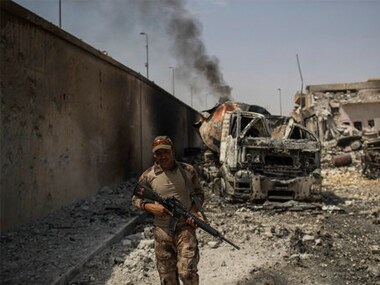 Iraqi Shiites slam calls to disband militia group that has been key in fighting Islamic State