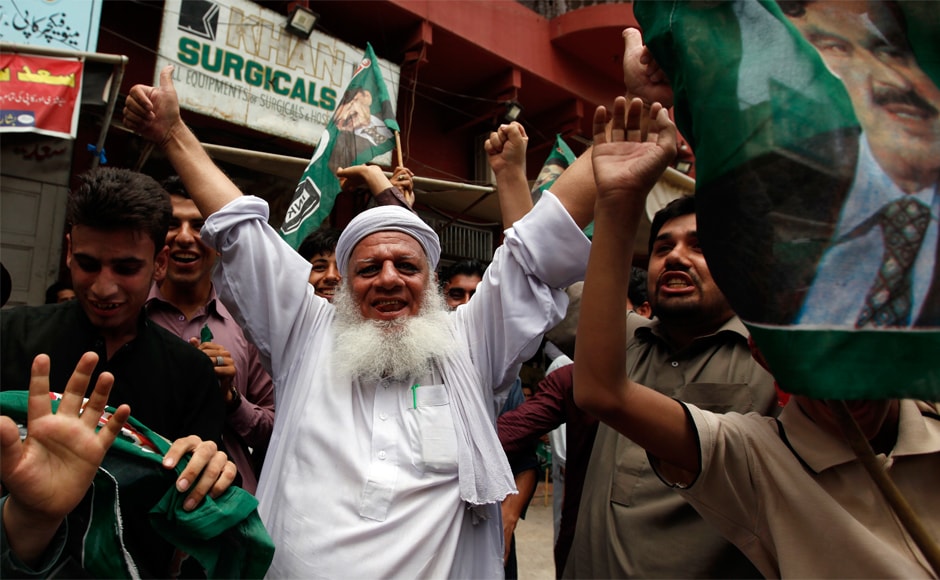 As the unanimous verdict by the five-judge bench was read out by Justice Ejaz Afzal Khan inside the packed courtroom 1 of the Supreme Court, a large number of opposition party workers celebrated in Rawalpindi. AP As the unanimous verdict by the five-judge bench was read out by Justice Ejaz Afzal Khan inside the packed courtroom 1 of the Supreme Court, a large number of opposition party workers celebrated in Rawalpindi. AP