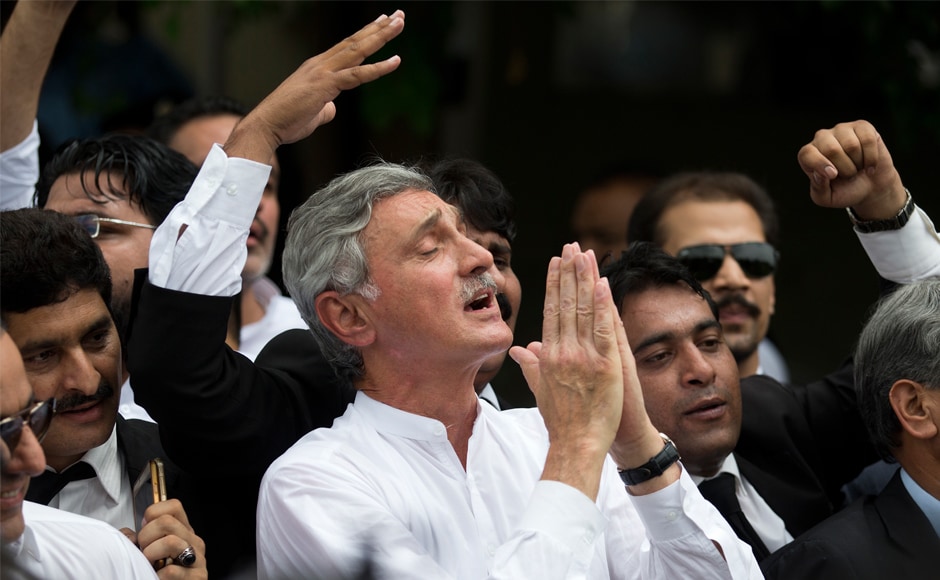 Senior opposition politician Jehangir Tareen celebrates the dismissal of Pakistani prime minister Nawaz Sharif outside the Supreme Court in Islamabad. The court also ordered the National Accountability Court to start a corruption case against Sharif, his children — Hussain and Hassan — and his daughter Maryam. AP Senior opposition politician Jehangir Tareen celebrates the dismissal of Pakistani prime minister Nawaz Sharif outside the Supreme Court in Islamabad. The court also ordered the National Accountability Court to start a corruption case against Sharif, his children — Hussain and Hassan — and his daughter Maryam. AP