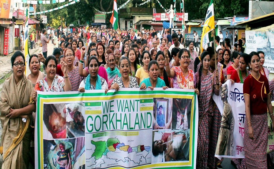 GJM supporters celebrated the birth anniversary of Nepali poet Bhanubhakta Acharya as 'Gorkha Jaati Ekta Diwas' and took out rallies carrying placards in favour of separate state of Gorkhaland. PTI GJM supporters celebrated the birth anniversary of Nepali poet Bhanubhakta Acharya as 'Gorkha Jaati Ekta Diwas' and took out rallies carrying placards in favour of separate state of Gorkhaland. PTI