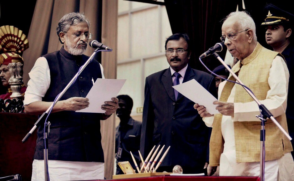 BJP leader Sushil Kumar Modi taking oath at Raj Bhawan. Nitish Kumar broke the grand alliance with the RJD and formed a government with the BJP. BJP leader Sushil Kumar Modi taking oath at Raj Bhawan. Nitish Kumar broke the grand alliance with the RJD and formed a government with the BJP.